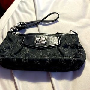 Black monogrammed Coach wallet wristlet used a few times but in good condition